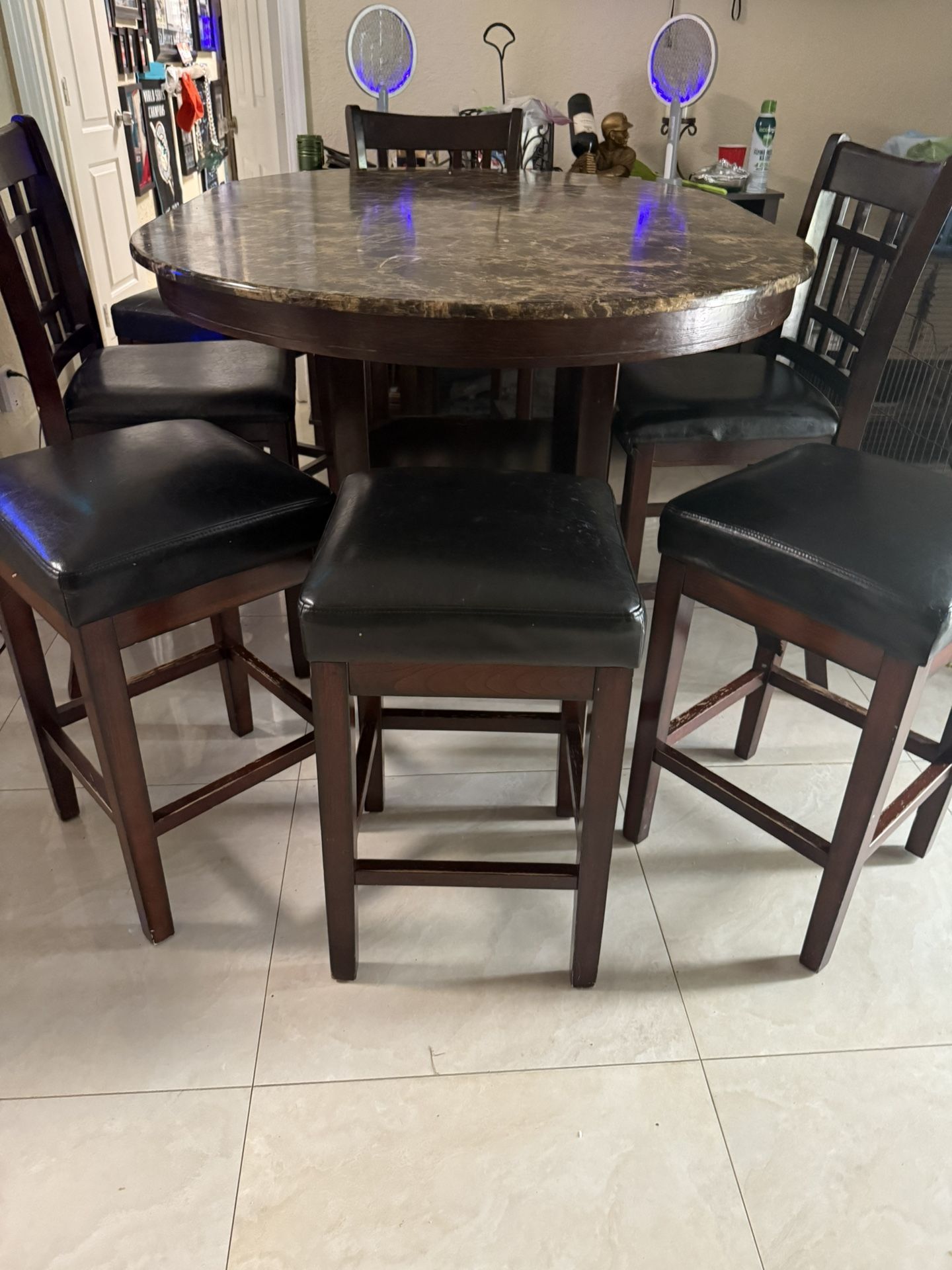6 Foot round Kitchen Table With 3 Chairs And 4 Stools.
