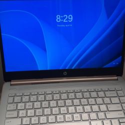 Rose gold HP computer 