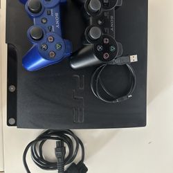 PS3 With Two Controllers + Games 