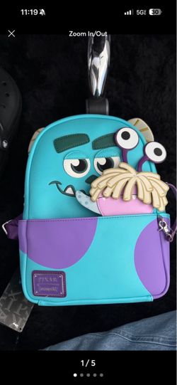 Loungefly backpack with wallet monsters inc