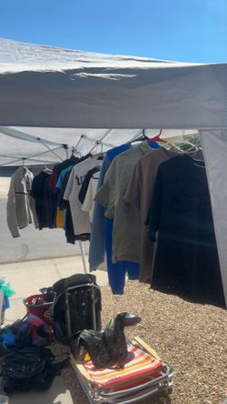 Yard sale shoes shirts and sweaters