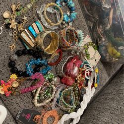 28 bracelets three necklaces
