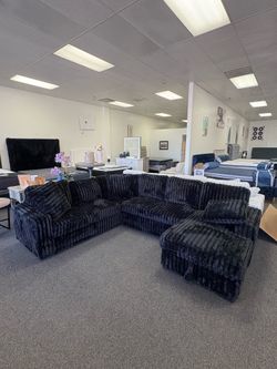 Black corduroy sleeper sectional with storage
