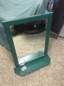 Mirror with shelf