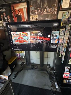 Large Flat Screen TV on Rolling Stand 75 inch not smart tv