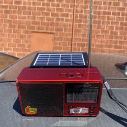 Solar Radio With Blue Tooth Connectivity And Outlet For Phone Charging