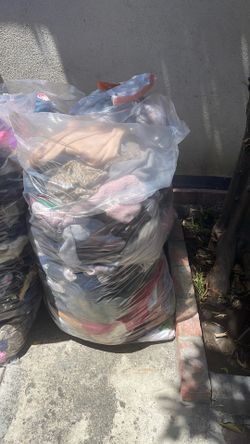 4 bags of mixed clothes (adults & kids)