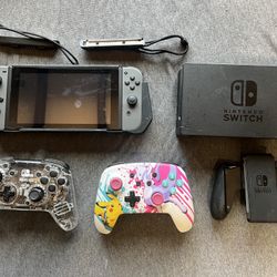 Nintendo Switch + Controllers