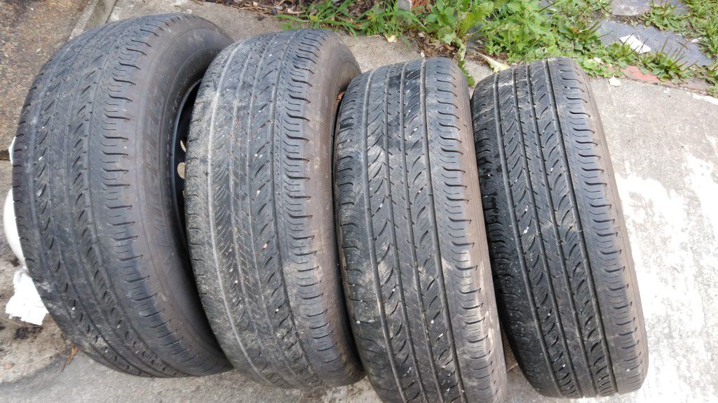 Set of 4 Michelin P205/65R15 All Season tires + rims