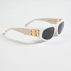 Sunglasses with a gold logo. Brand new.