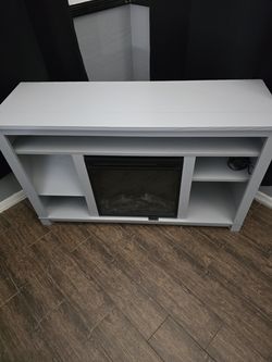 Functional electric fireplace/stand
