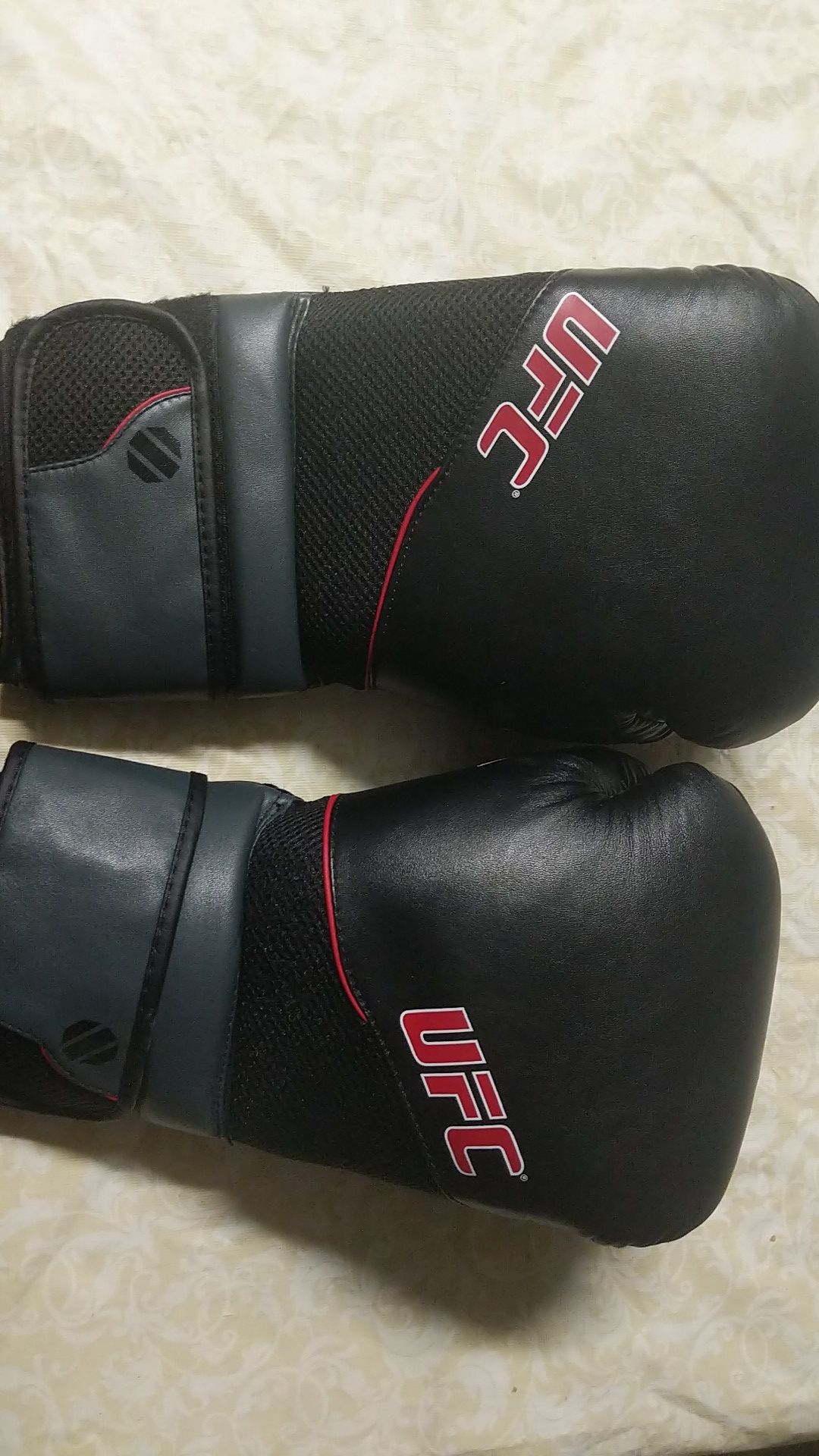 UFC Boxing Gloves includes with two pounds dumbells