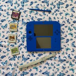Blue Nintendo DS With 4 Games 