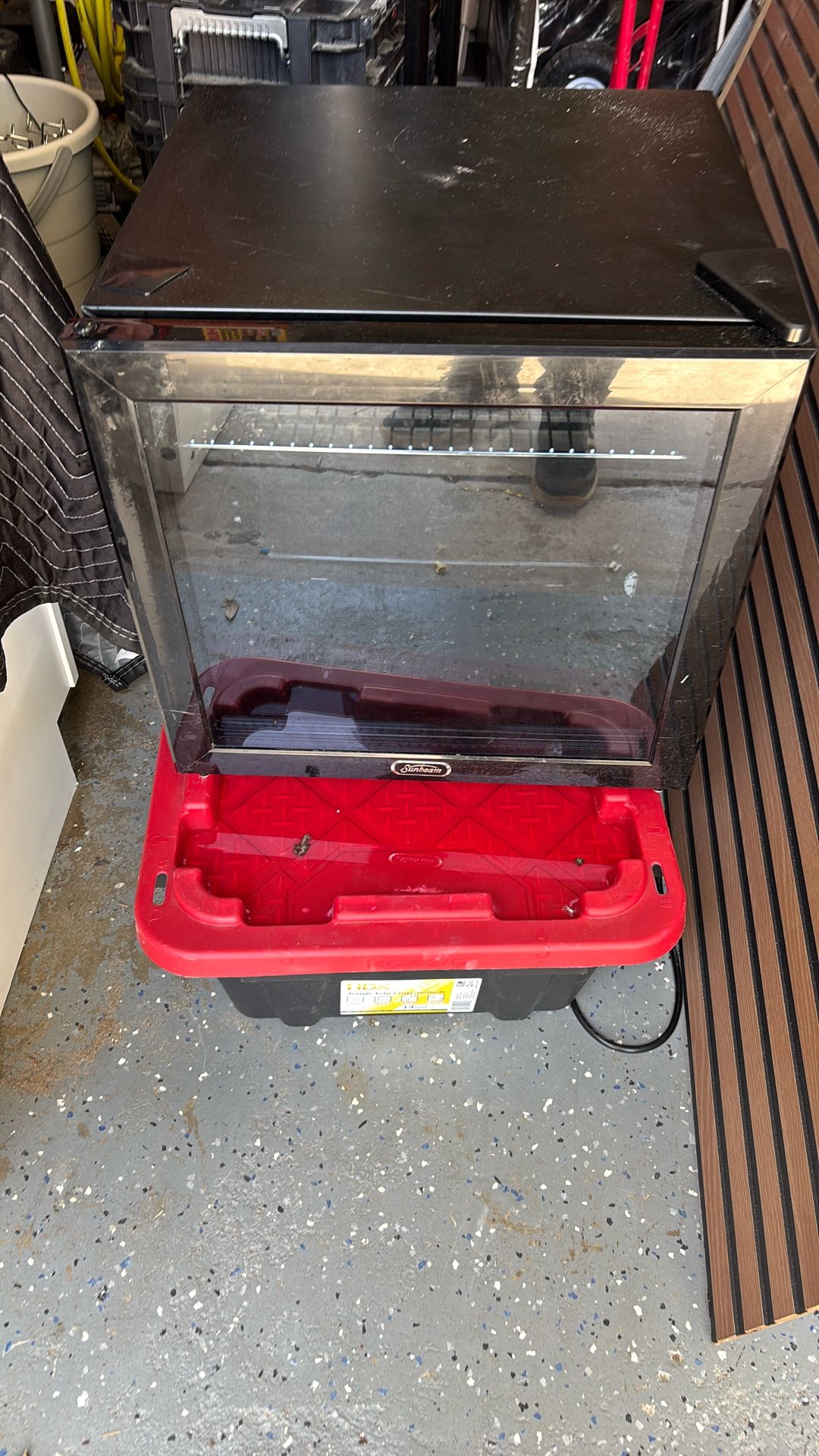 Mini sunbeam fridge with glass front.