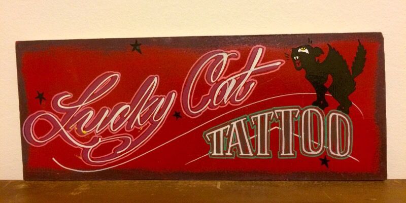 Lucky cat tattoo shop sign hand painted