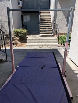 Gymnastics beam and pad