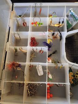 Tackle box with lots of fishing supplies