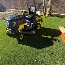 Ryobi riding mover 80volt come w 3 10Ah  batteries and charger costumer return to Home Depot as is $2200