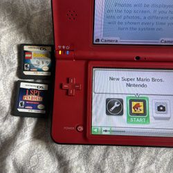 Nintendo DSi XL & 3 Games