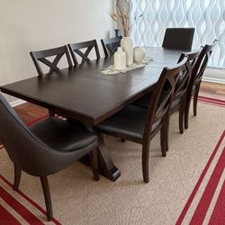 Dinning Table With 8 Chairs 2 Being Captain Chairs