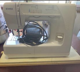 $125, Kenmore Sewing Machine