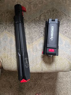 Husky 2200 Lumen Led Work Light.  Tripod and unit do not attach. Might be due to worn threading still works though.  Accept Venmo or Cash only