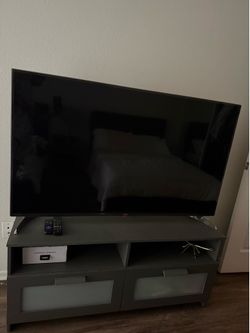 48" LG Smart TV - Good Condition with Remotes and Stand