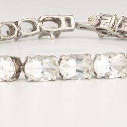 White Topaz Bracelet in Platinum over Sterling Silver with 27 Oval 7x5mm White topaz 7.5 inches TGW 24.25
