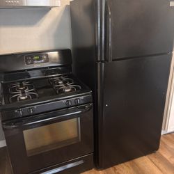Nice refrigerator and gas stove both work great $50 delivery fee Milwaukee area