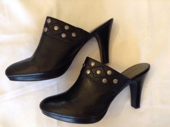 Women’s DANA BUCHMAN black leather heel clogs with silver studs. Size-9 1/2