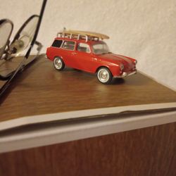 Collectible Volkswagen Surf Wagon With Board
