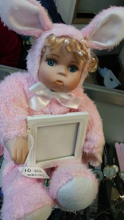 Porcelain bunny doll plays music