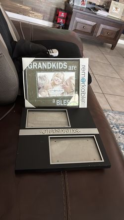 Two photo frames for grandkids photos.
