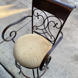 2 Brown Metal Swivel Stools