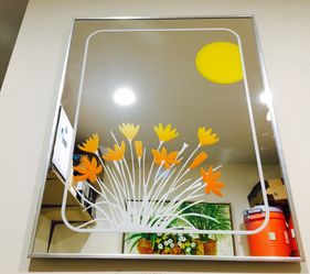 Yellow petaled flower etched clear mirror