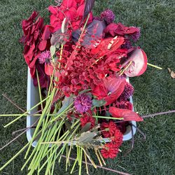 Burgundy and red artificial flowers