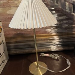White pleated Modern lamp with gold hardware