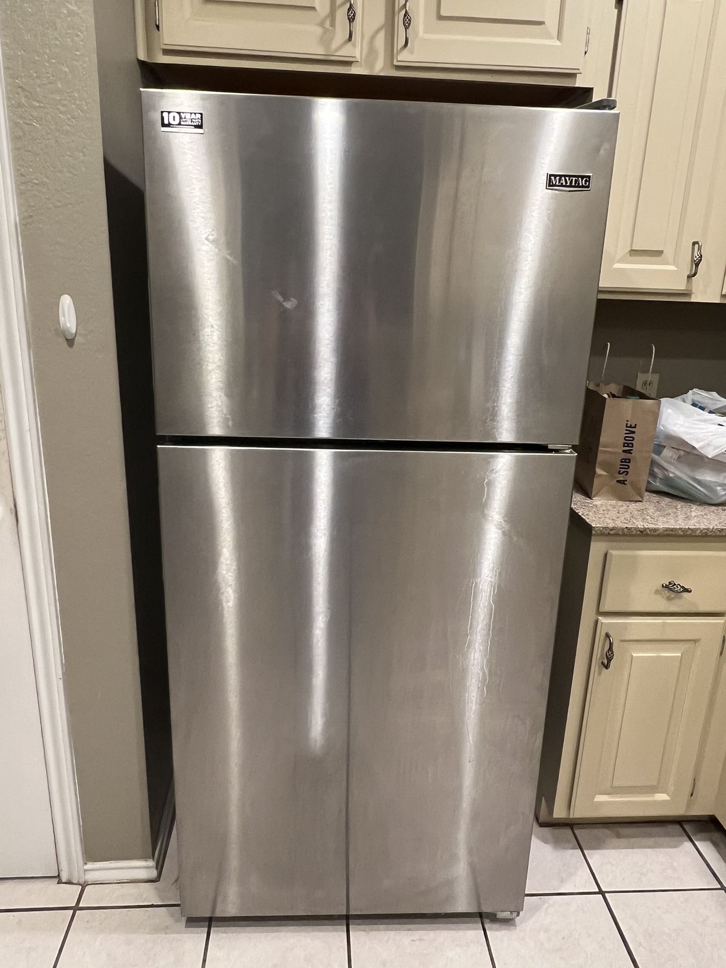 Maytag Refrigerator- Maytag Refrigerator-Works great. Selling because moving & no longer need. Dimensions: 65H, 30W, 31D. 