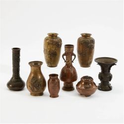 Eight Asian metal ware decorative vessels