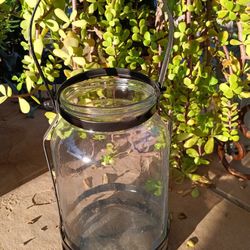 $9 Garden Candle Holder/ Plant. Glass with Black Metal Hanger 
10"x 7"