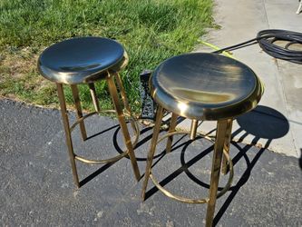 Set of gold color bar stools