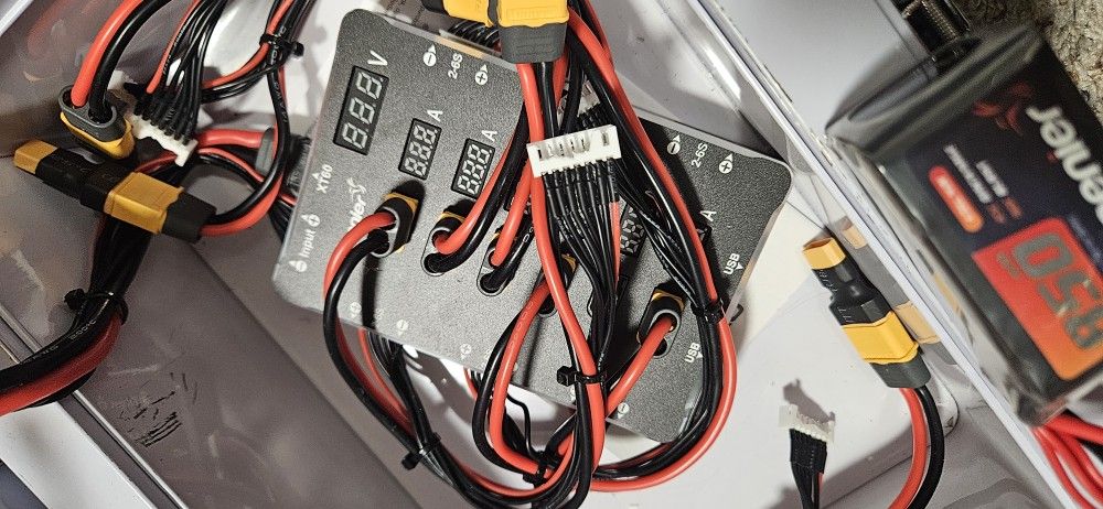 Drone Batteries And Charger And Fire Box