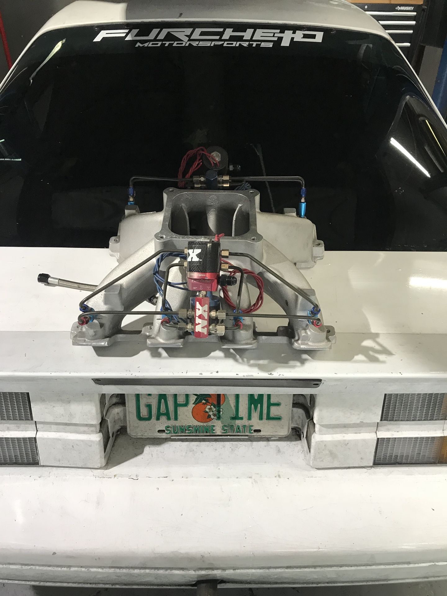 Ls3 super victor carb 4500 intake with a nx fogger kit.