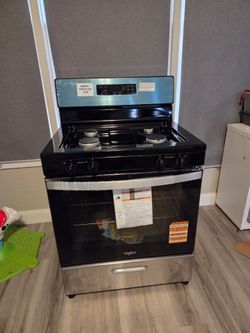 Whirlpool 30-in 4 burners 5.1-cu ft Freestanding Natural Gas Range (Stainless Steel)