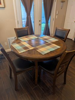 46 in Table and 4 matching chairs