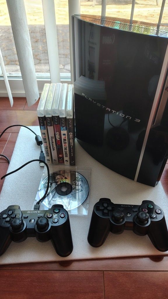 PlayStation 3 With 2 Controllers And Six Games Bundle