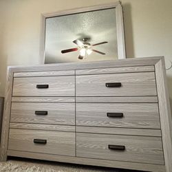 Dresser with drawers and mirror