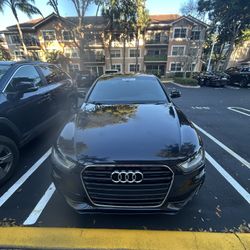 2015 Audi A4 • 2.0T Quattro Premium Sedan 4D