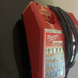 Milwaukee Brand New Battery And Used Battery Charger