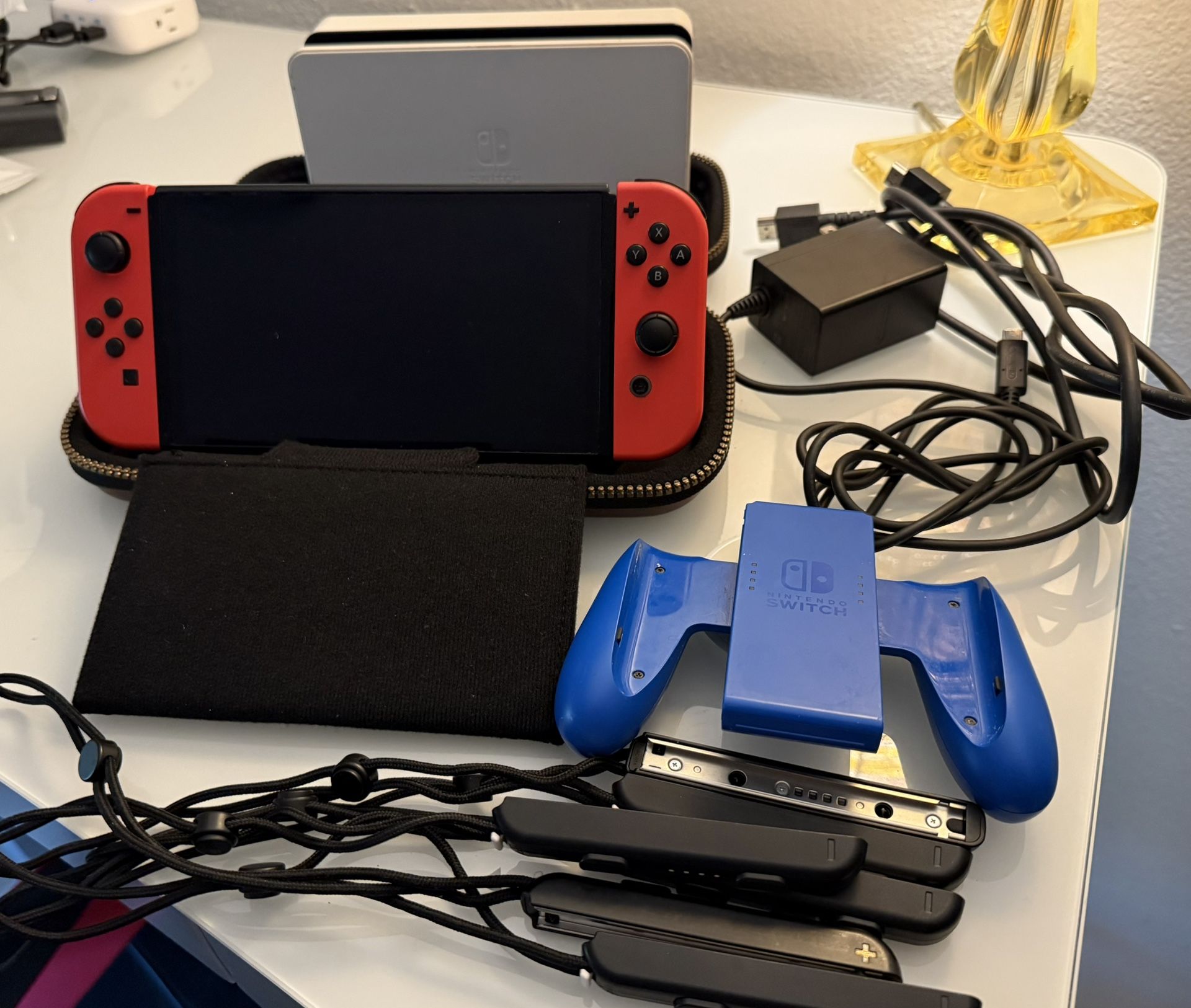 Nintendo Switch OLED w/ Mario Red Joycons And Blue Joycon Grip